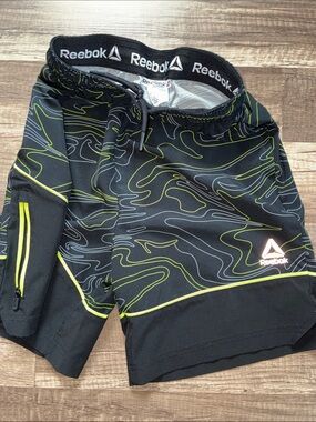 Reebok Black Athletic Shorts with Neon Green and Gray Wave Print
